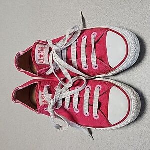 Pink Converse tennis shoes